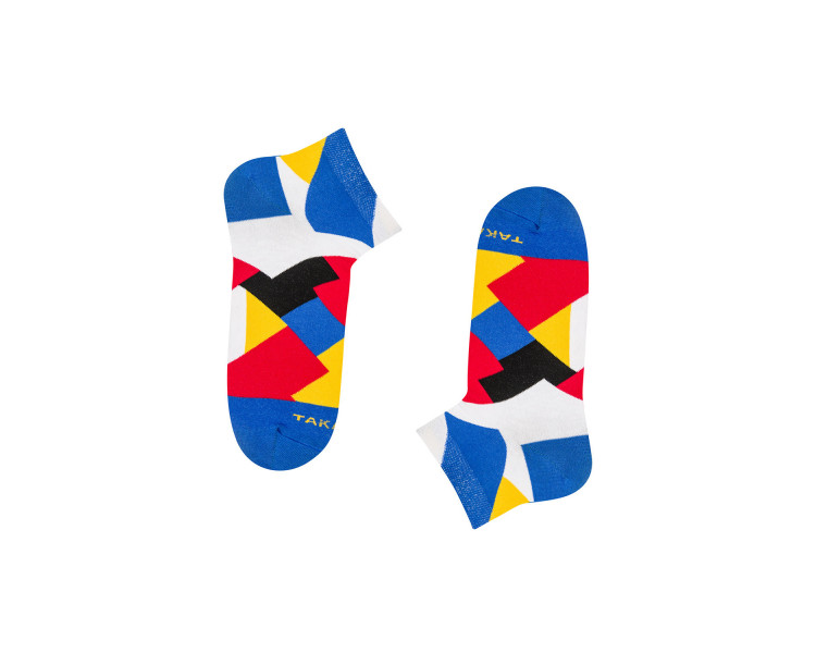 Colorful socks Targowa 11m3 feet in colorful rectangles of blue, red, yellow and white. Takapara