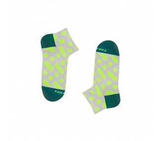 Colorful sneaker socks Wilcza 13m2 with green spots and dots on a gray background. Takapara