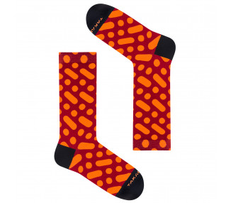 Colorful socks Wilcza 13m4 with orange dots and stripes on a red background. Takapara