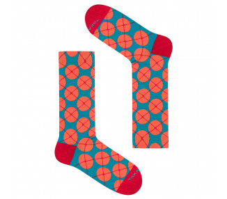 Colorful socks Wólczańska 7m1 with orange polka dots on a blue background. Takapara